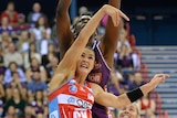 Sharni Layton battles for the ball with Romelda Aiken