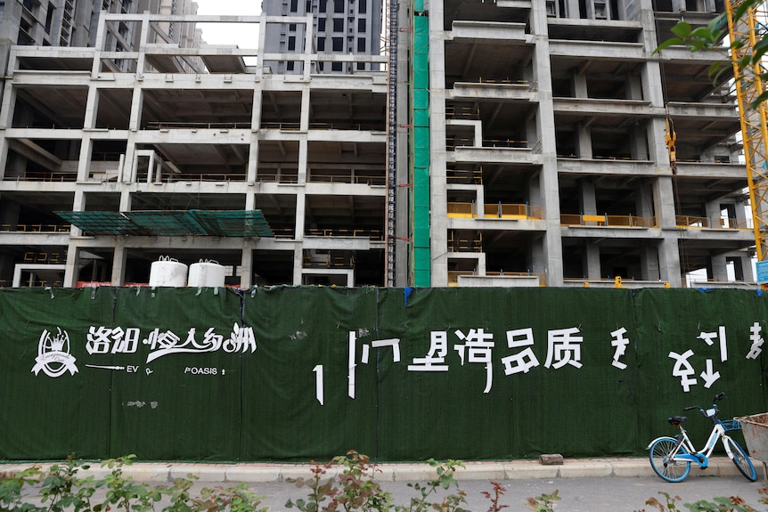 尽管住宅建筑尚未完工，但专家说中国的房价尚未达到低点。