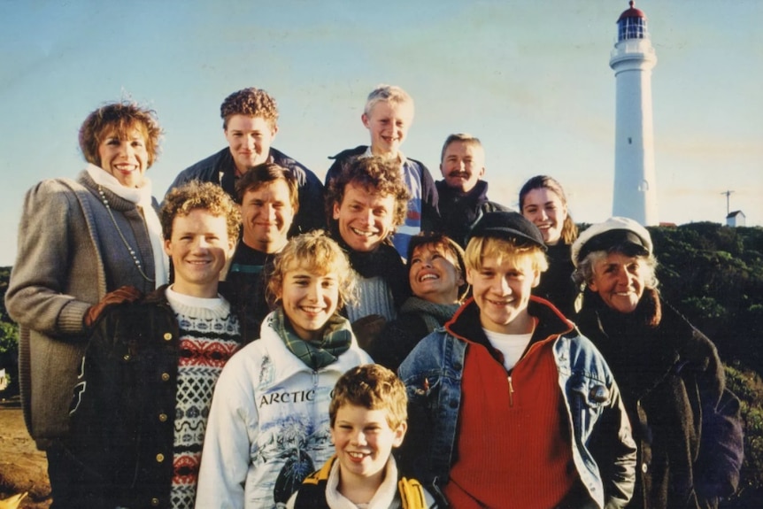 Round The Twist cast in front of the lighthouse.
