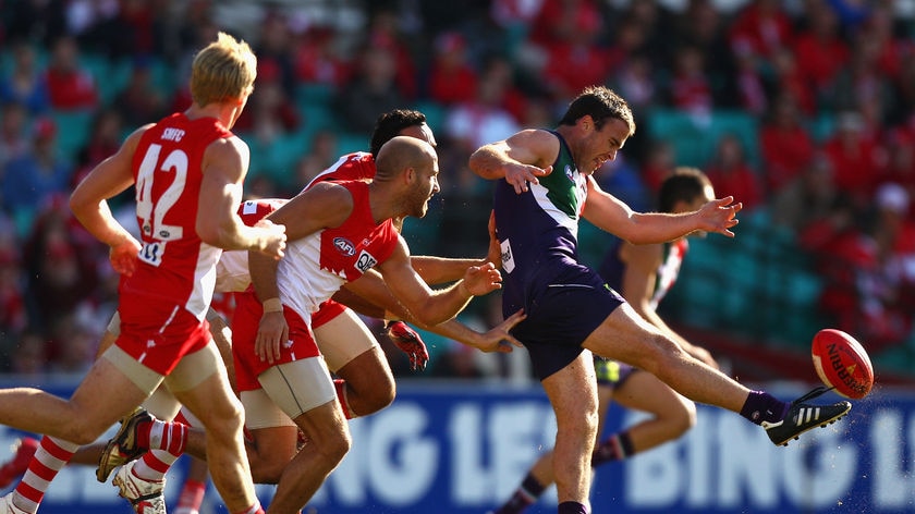 Kicking clear: Paul Hasleby was one of four Fremantle players to boot two goals.