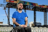 Man in front of stage