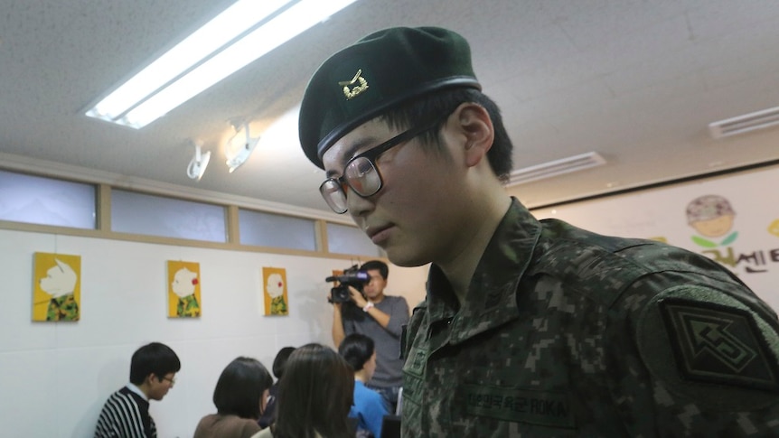 South Korean army Sergeant Byun Hui-su walking out of a room.