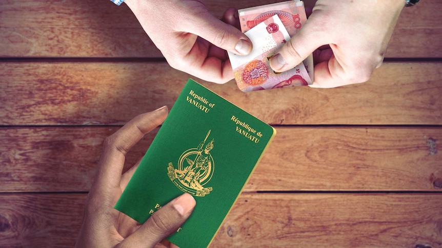 A top-down shot of a person handing over Chinese yuan for a green Vanuatu passport.