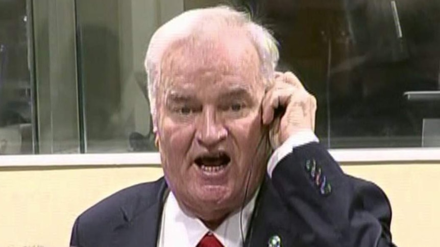 Bosnian Serb military chief Ratko Mladic appears to yell during an outburst in the courtroom