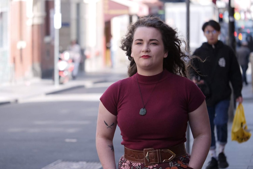 Sophie Worsnop-Hair walks down Little Bourke Street in the Melbourne CBD