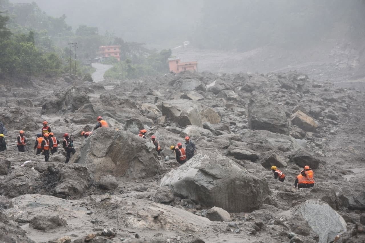 Live: Rescuers in Nepal race to reach workers stuck in hydropower tunnels