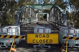 A bridge closed and barricaded