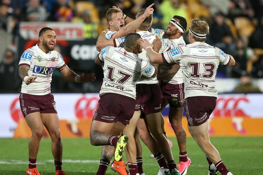 Manly's Daly Cherry-Evans celebrates kicking the winning field goal against the Warriors.