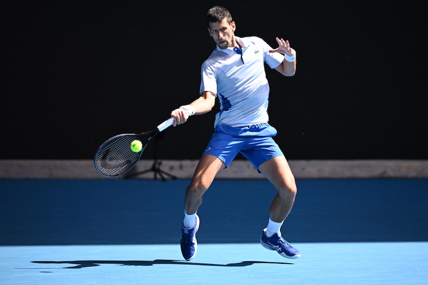 Novak Djokovic plays a forehand at the 2024 Australian Open.