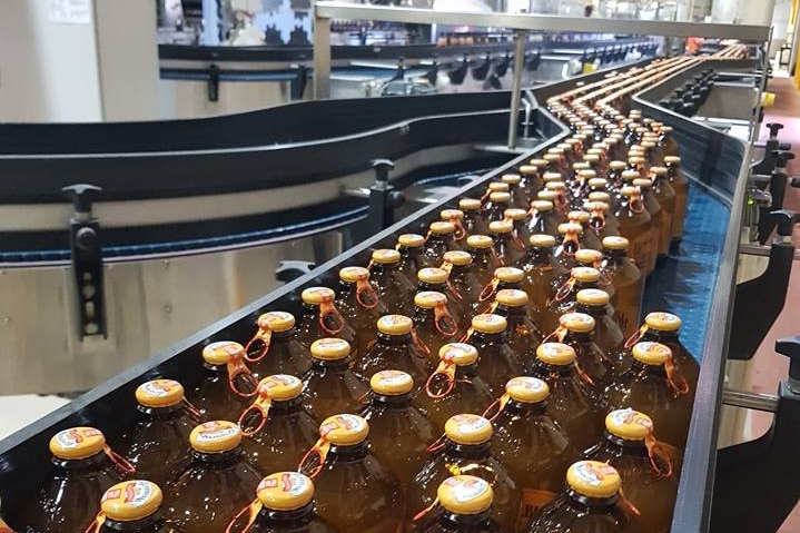 Bottles of ginger beer on the production line at the factory in Bundaberg.