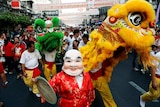 People perform Chinese Lion dance in Chinatown during the Chinese Lunar New Year in Bangkok
