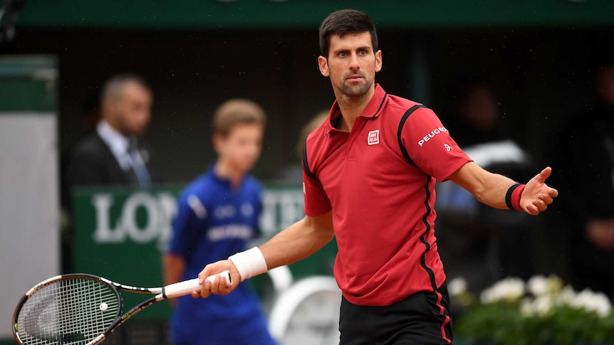 Novak Djokovic shrugs