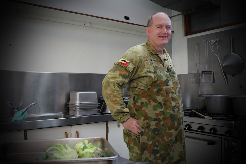 Graeme Bray in the kitchen of the 41st Battalion headquarters