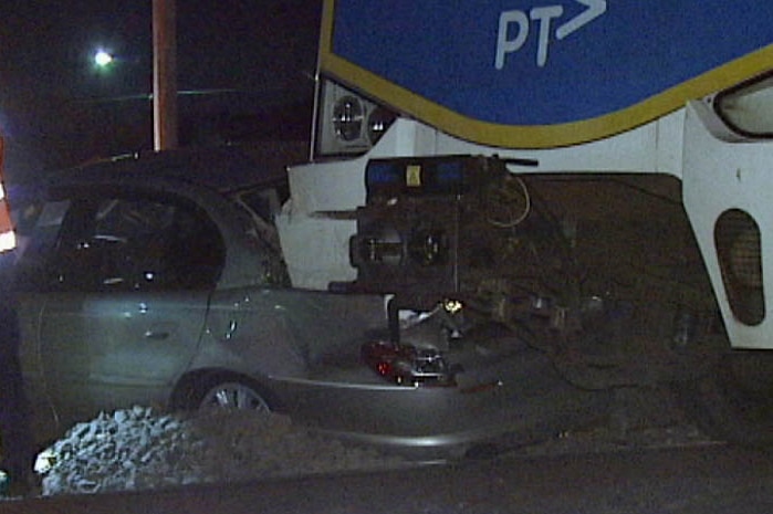 The Melbourne train crashed into the rear of the car which was stuck on the tracks