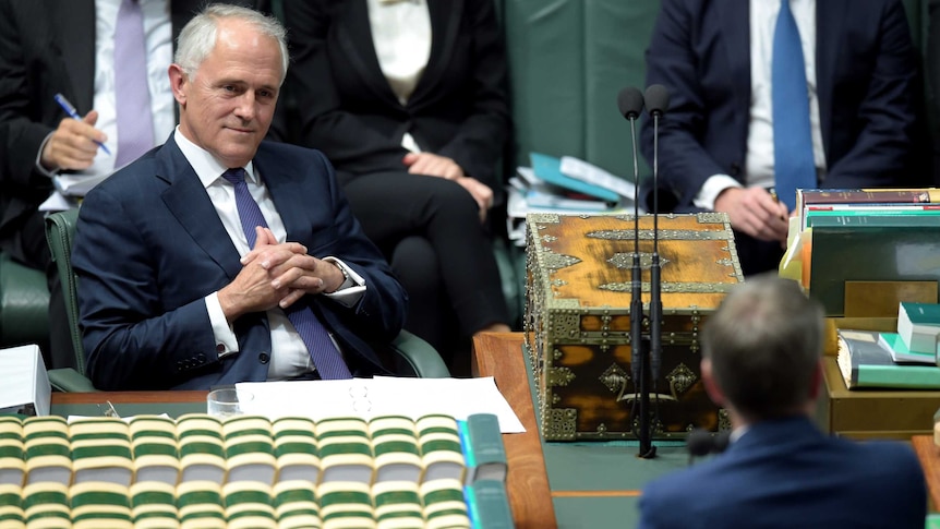 Australian Prime Minister Malcolm Turnbull (left) listens to Federal Opposition Leader Bill Shorten during House of Representatives Question Time at Parliament House in Canberra