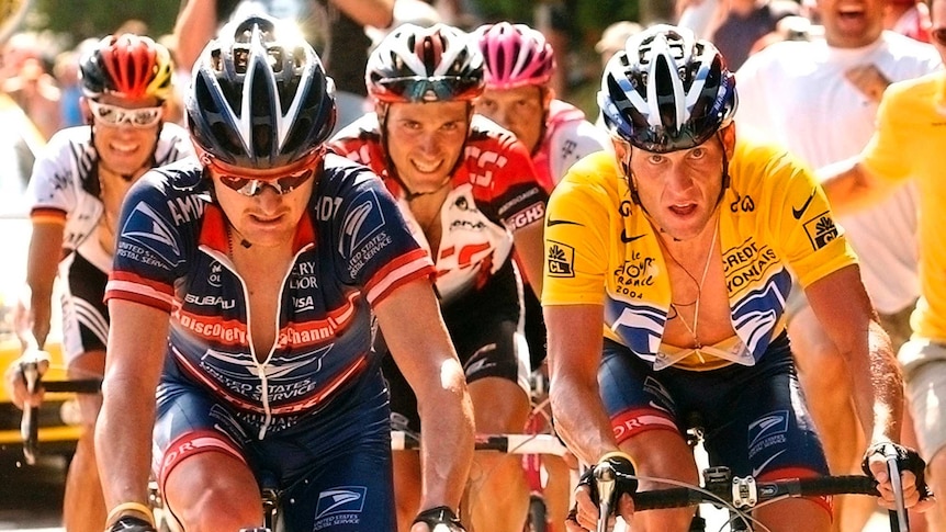 Lance Armstrong rides alongside Floyd Landis during the Tour de France