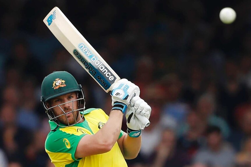 Australia batsman Aaron Finch watches a cricket ball as it fizzes away from his bat during a World Cup match against England.