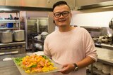 Chef and food writer Vincent Lim with the tossed Yusheng