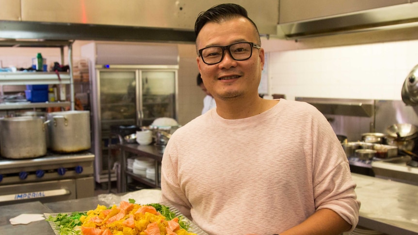 Chef and food writer Vincent Lim with the tossed Yusheng