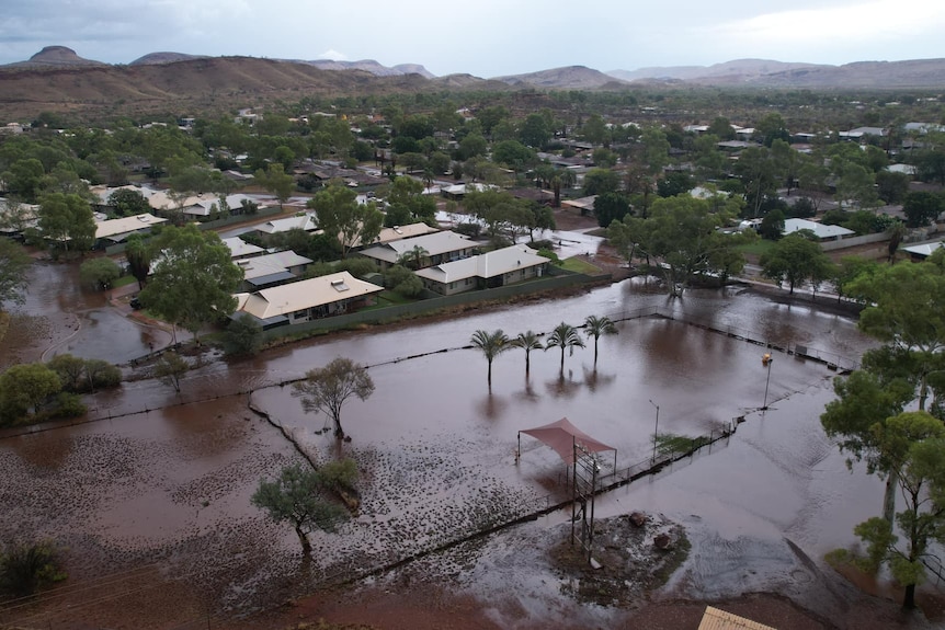 A drone shot of flooding in the town of Tom Price