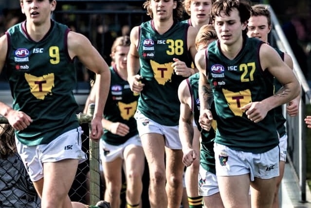 Tasmania Devils football players.