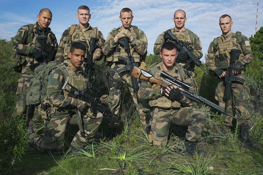 Legionnaire Scott (second from left) with his comrades from Nepal, Ukraine, Russia, South Africa, Cuba and Moldova.