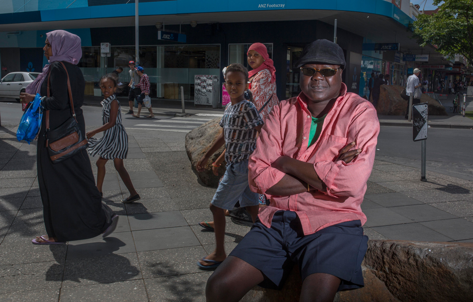 Footscray resident Manyuon sits in the Nicholson Street mall.