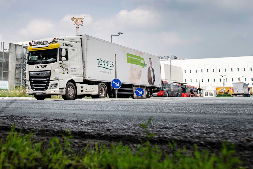 A truck leaves the Toennies meatpacking plant in Rheda-Wiedenbrueck, Germany.