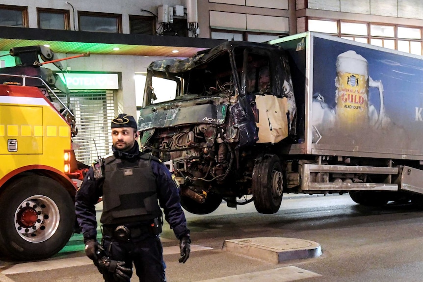 The smashed up cabin of a truck that crashed into a crowd in Stockholm.