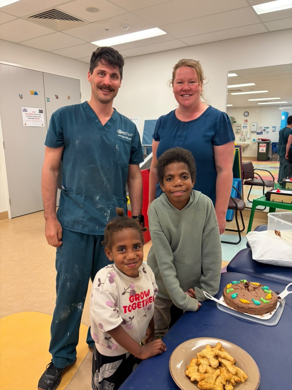 Two physios with child patients