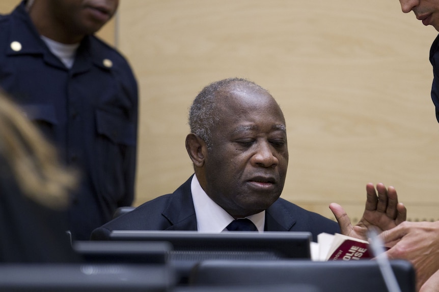 Former Ivorian president Laurent Gbagbo appears before the ICC for the first time