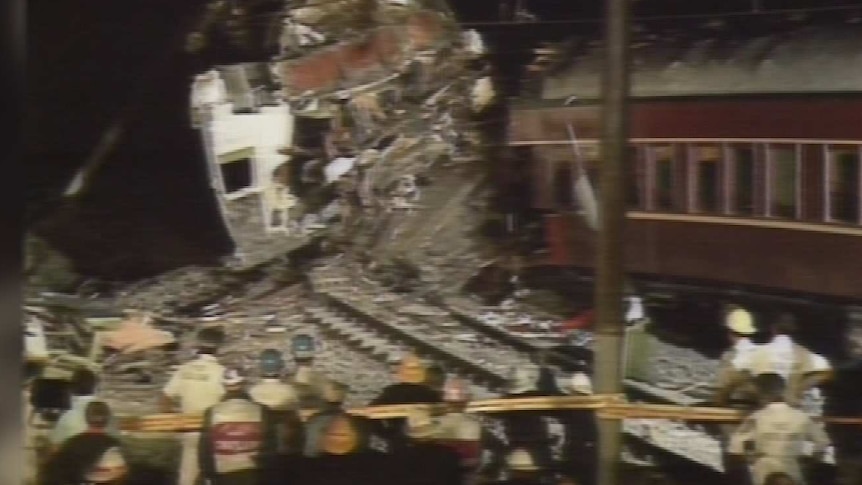 a still image of news footage showing the crash scene