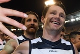 Patrick Dangerfield celebrates with fans after win over Swans