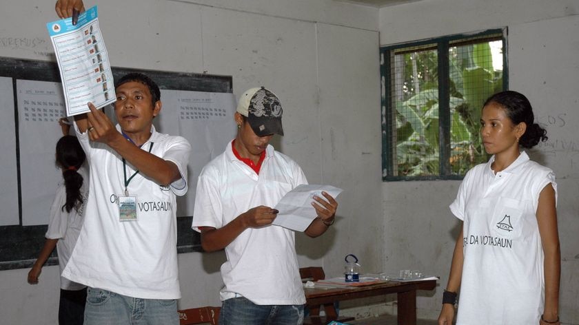 East Timorese electoral officials sort ballots.