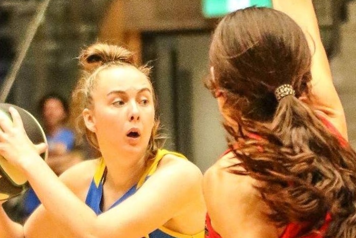 Bendigo Spirit player Demi Skinner looks for a clean pass in the middle of the game