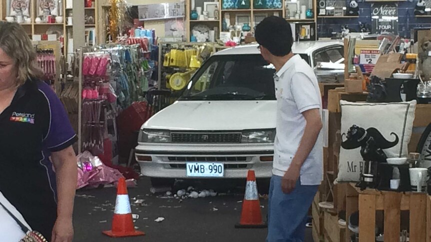 Police said the car reversed into the Port Adelaide shop