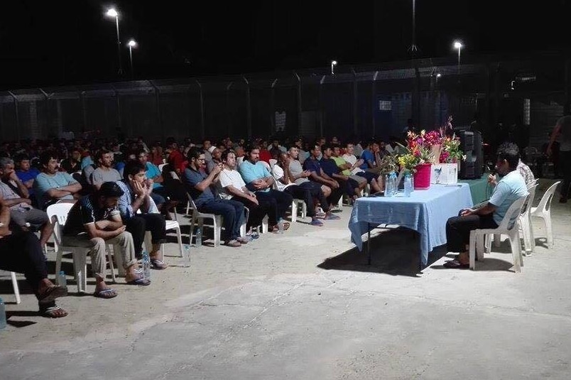 Refugees on Manus Island holding a service for drowned Pakistani refugee Kamil Hussain on the 4th of August 2016.