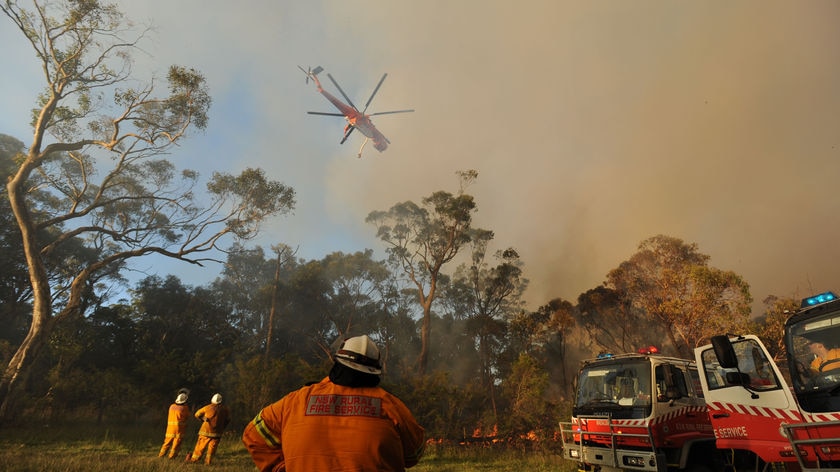 NSW volunteers work to contain a fire