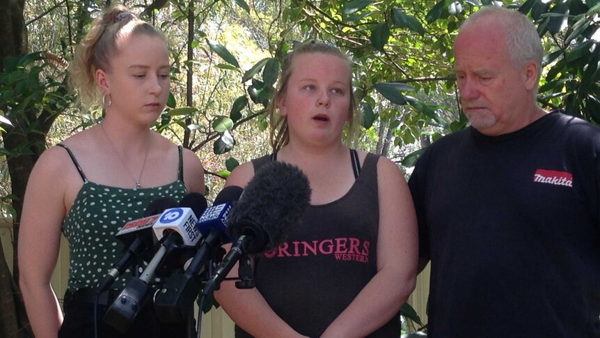 Holly, Rhiannon and Darryl Symons say they don't understand why someone would target the much loved dog.