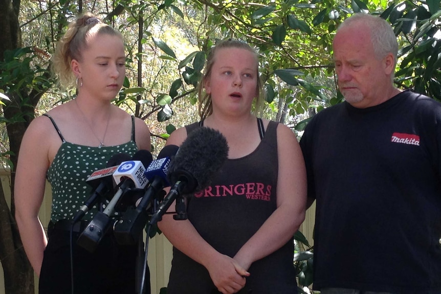 Holly, Rhiannon and Darryl Symons say they don't understand why someone would target the much loved dog.