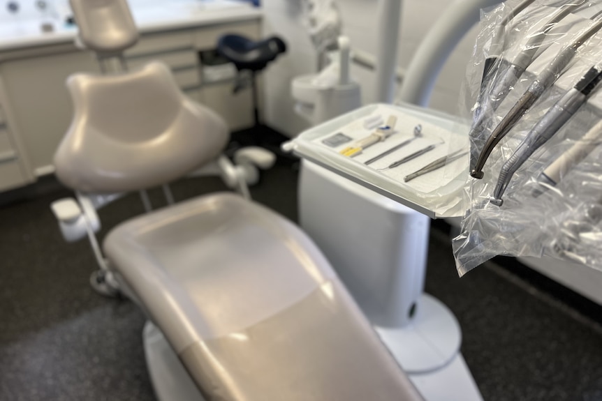 A dental chair seen from above. 