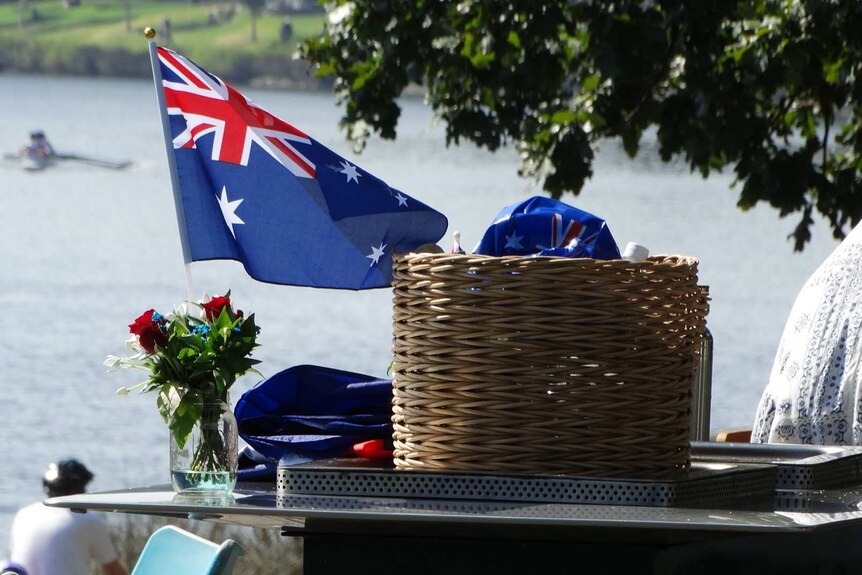 A picnic basket sits near the Yarra River, in Melbourne, on Australia Day.