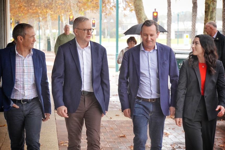 Roger Cook walking with Anthony Albanese, Mark McGowan and Magenta Marshall.