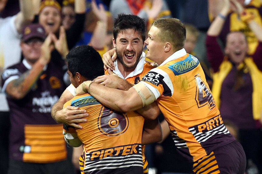 Ben Hunt, Dale Copley and Anthony Milford celebrate against Eels