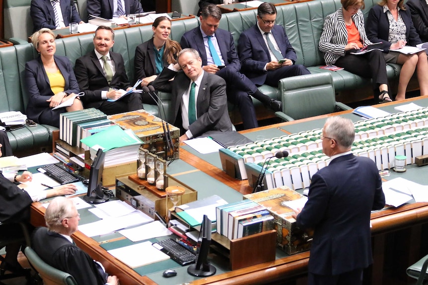 Bill Shorten listens to Malcolm Turnbull
