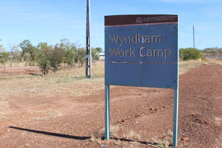 A sign for a prison camp at the side of an outback highway leading into the Kimberley town of Wyndham.