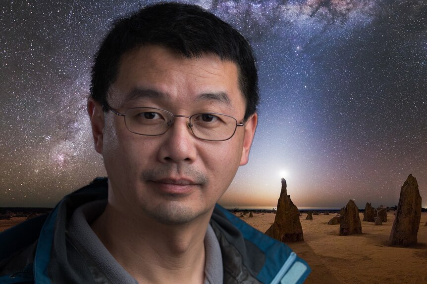 Michael Goh, left, is seen superimposed over an image with rocks in the background and the Milky Way starry night sky above.