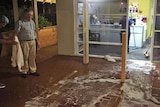 Staff clean up minor flood damage