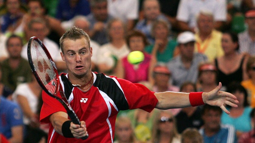 Lleyton Hewitt gets it done at the net.