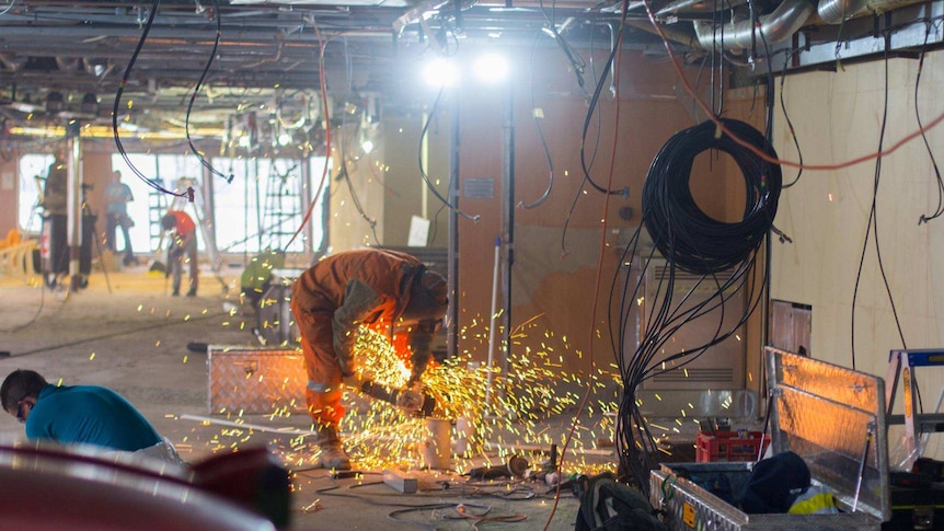 Worker welds onboard the Spirit of Tasmania I ferry